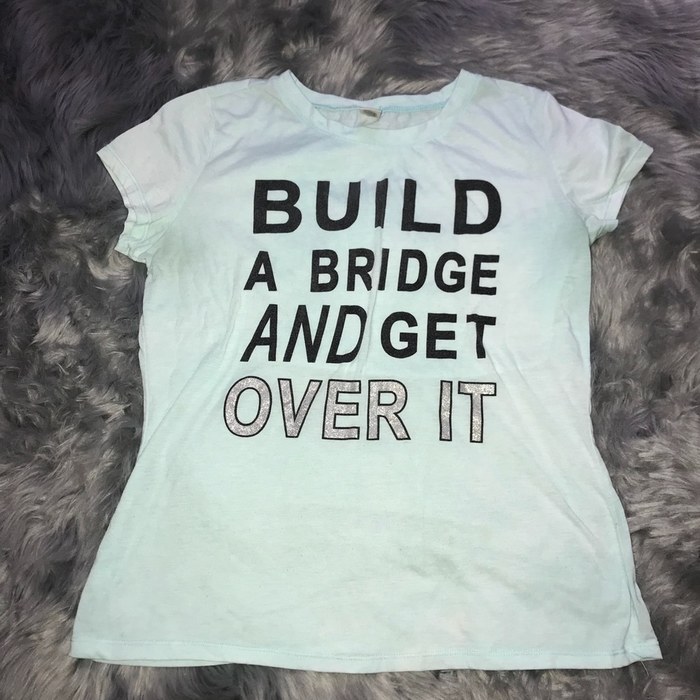AWESOME BABY BLUE GRAPHIC TEE on hold